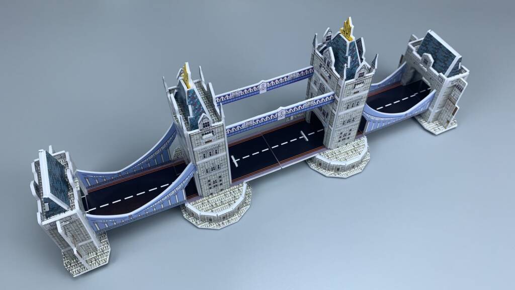 Tower Bridge with blue-lit roadway and towers over the Thames, London, England