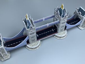 Tower Bridge with blue-lit roadway and towers over the Thames, London, England