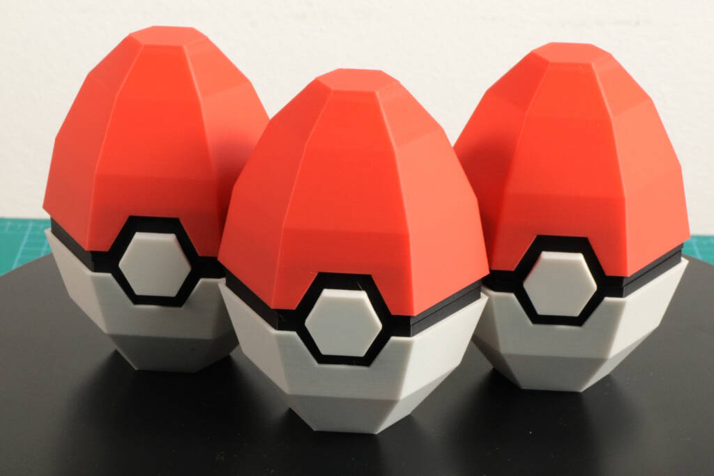 Pokéball egg set with red-and-white shell halves and black center button details